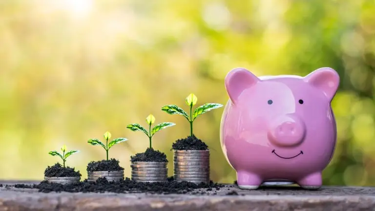 Pink ceramic piggy bank — symbolising financial return on investment from proactive wellbeing strategies.