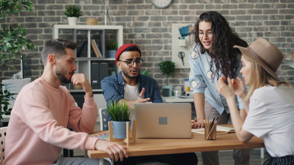 Diverse team collaborating in a workplace meeting